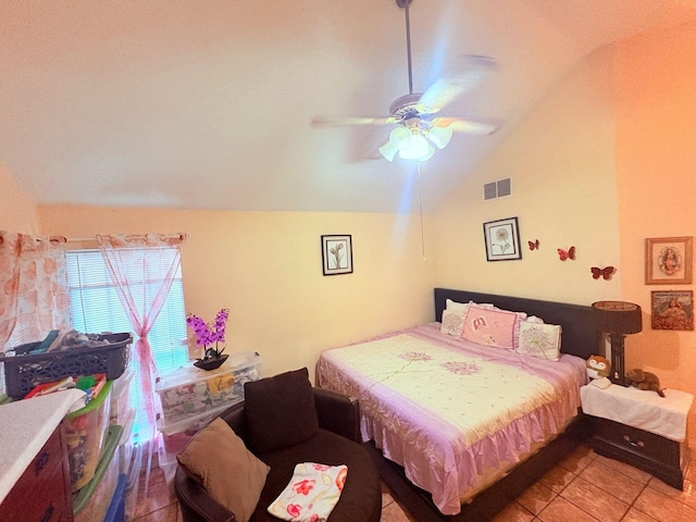 12943 Bamboo Forest Trl, Houston, TX 77044 - bedroom featuring lofted ceiling, light tile patterned flooring, and a ceiling fan
