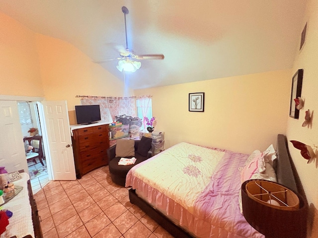 12943 Bamboo Forest Trl, Houston, TX 77044 - bedroom with lofted ceiling, light tile patterned flooring, and a ceiling fan