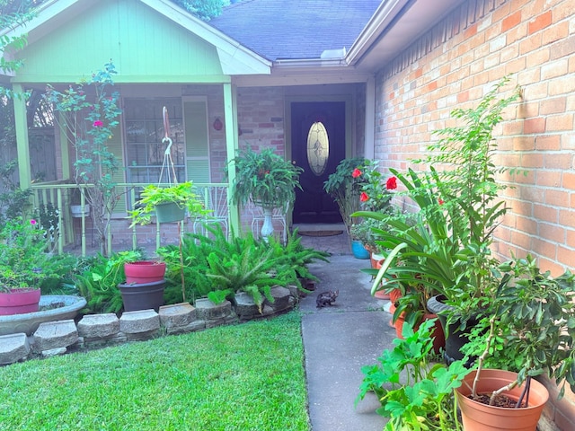 12943 Bamboo Forest Trl, Houston, TX 77044 - property entrance featuring brick siding and covered porch