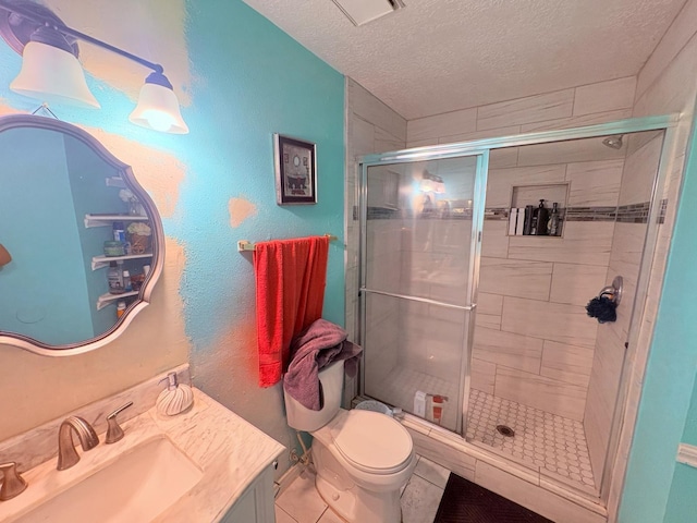 12943 Bamboo Forest Trl, Houston, TX 77044 - full bathroom featuring a textured ceiling, vanity, and a stall shower