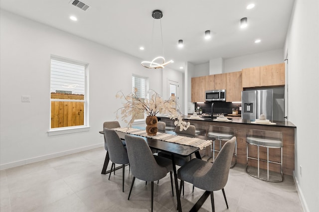 1018 Patton St, Houston, TX 77009 - dining room featuring a chandelier and recessed lighting