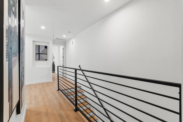 1018 Patton St, Houston, TX 77009 - hallway featuring an upstairs landing, light wood-style flooring, and recessed lighting