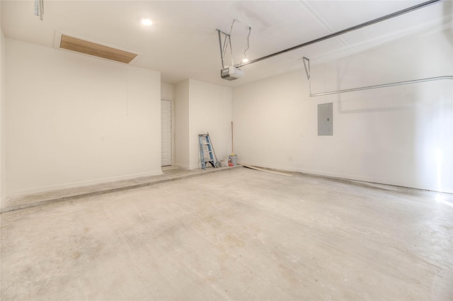 175 Echo Ln, Livingston, TX 77351 - garage with a garage door opener and electric panel