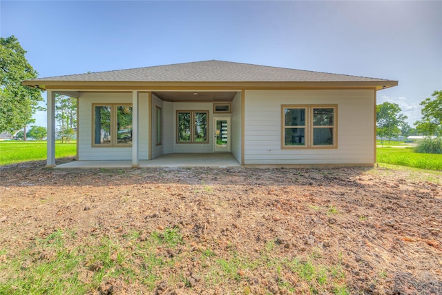 175 Echo Ln, Livingston, TX 77351 - rear view of property with a patio area