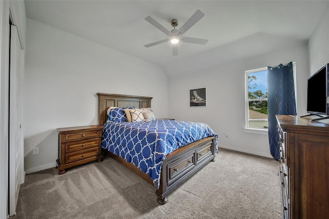 3140 Red Buckeye Ln, Conroe, TX 77301 - carpeted bedroom featuring vaulted ceiling and a ceiling fan
