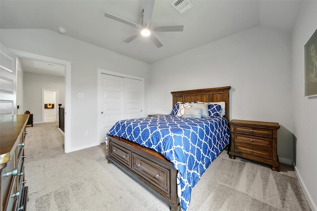 3140 Red Buckeye Ln, Conroe, TX 77301 - bedroom with vaulted ceiling, light carpet, a closet, and ceiling fan