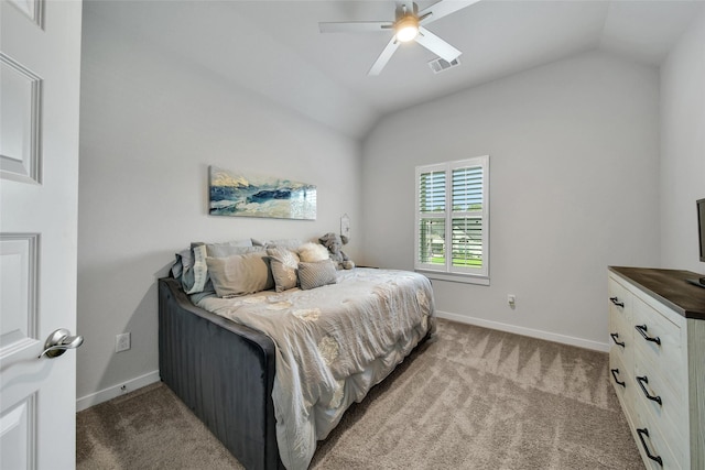 3140 Red Buckeye Ln, Conroe, TX 77301 - bedroom featuring light carpet, vaulted ceiling, and ceiling fan