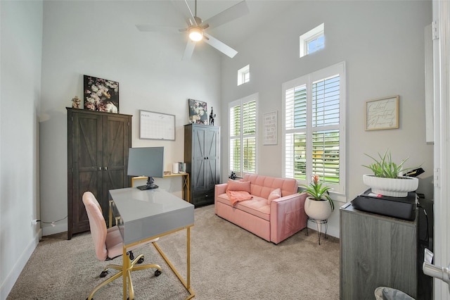 3140 Red Buckeye Ln, Conroe, TX 77301 - office with light colored carpet, a towering ceiling, and a ceiling fan