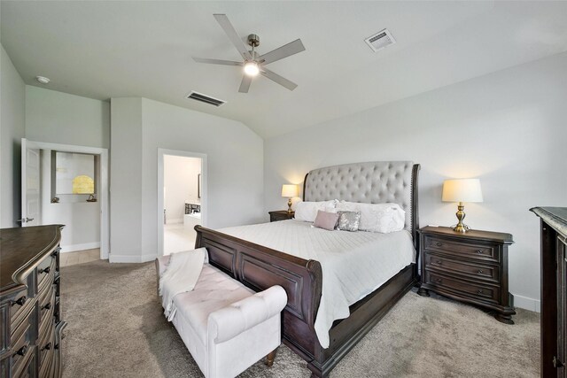 3140 Red Buckeye Ln, Conroe, TX 77301 - bedroom with light colored carpet, vaulted ceiling, ceiling fan, and connected bathroom