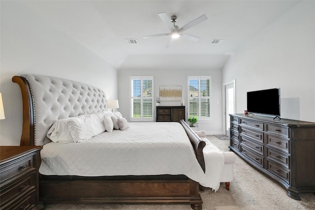 3140 Red Buckeye Ln, Conroe, TX 77301 - bedroom featuring light carpet, lofted ceiling, and ceiling fan