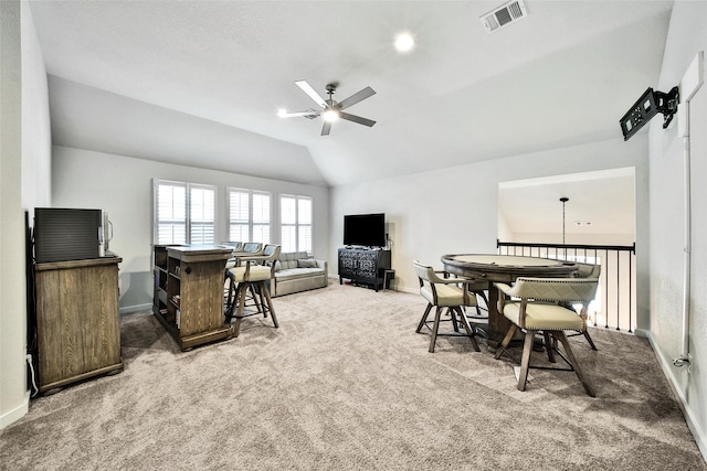 3140 Red Buckeye Ln, Conroe, TX 77301 - carpeted dining space with ceiling fan and lofted ceiling