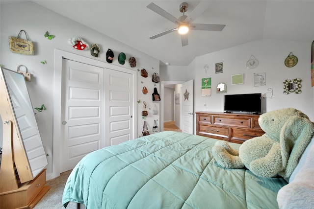 3140 Red Buckeye Ln, Conroe, TX 77301 - bedroom featuring vaulted ceiling, carpet, a closet, and a ceiling fan