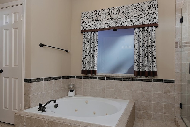 15 Amber Sky Pl, The Woodlands, TX 77381 - bathroom featuring a jetted tub