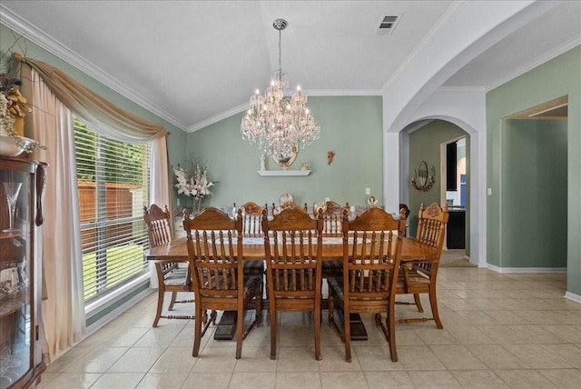 10002 Dawn Brook Dr, Pearland, TX 77584 - dining room with crown molding, arched walkways, a chandelier, and light tile patterned floors
