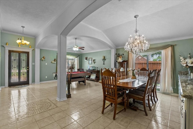 10002 Dawn Brook Dr, Pearland, TX 77584 - dining space featuring a chandelier, vaulted ceiling, arched walkways, ornamental molding, and light tile patterned floors
