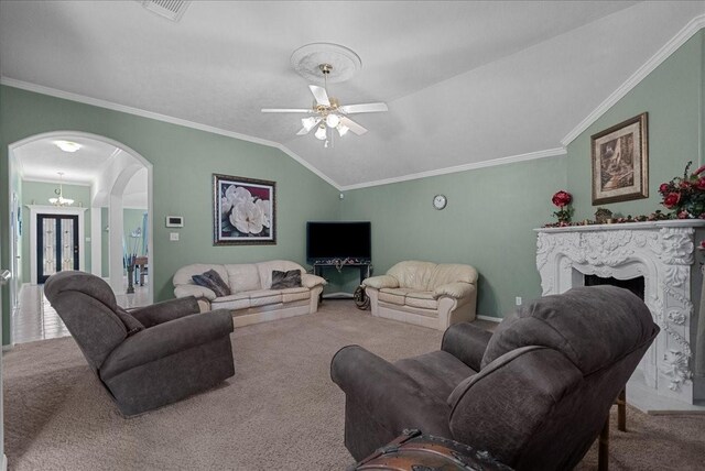 10002 Dawn Brook Dr, Pearland, TX 77584 - living room with carpet, arched walkways, vaulted ceiling, ornamental molding, and ceiling fan