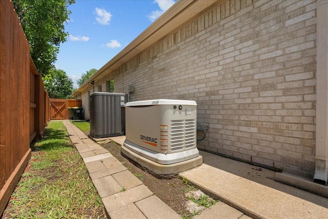 10002 Dawn Brook Dr, Pearland, TX 77584 - exterior view of brick siding and a gate