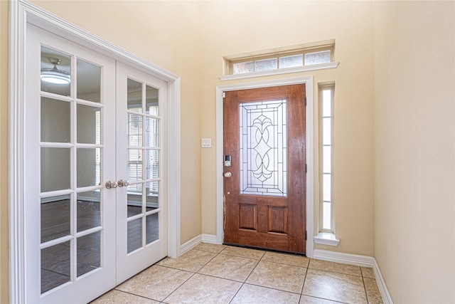 22411 Limestone Crest Ln, Katy, TX 77449 - entryway featuring french doors and light tile patterned floors