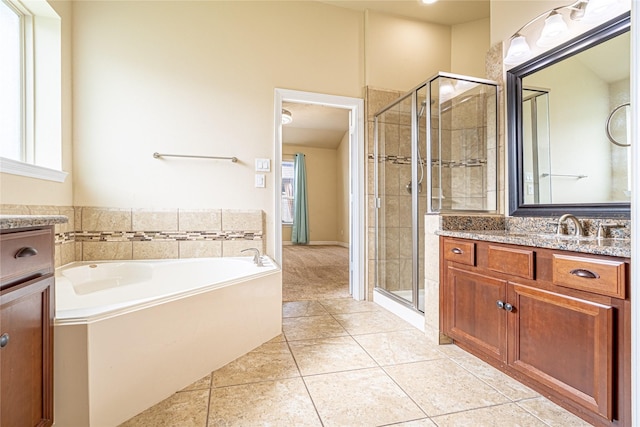 22411 Limestone Crest Ln, Katy, TX 77449 - full bath with vanity, a shower stall, a bath, and tile patterned flooring