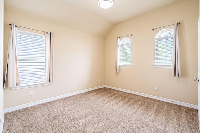 22411 Limestone Crest Ln, Katy, TX 77449 - carpeted spare room with vaulted ceiling and baseboards