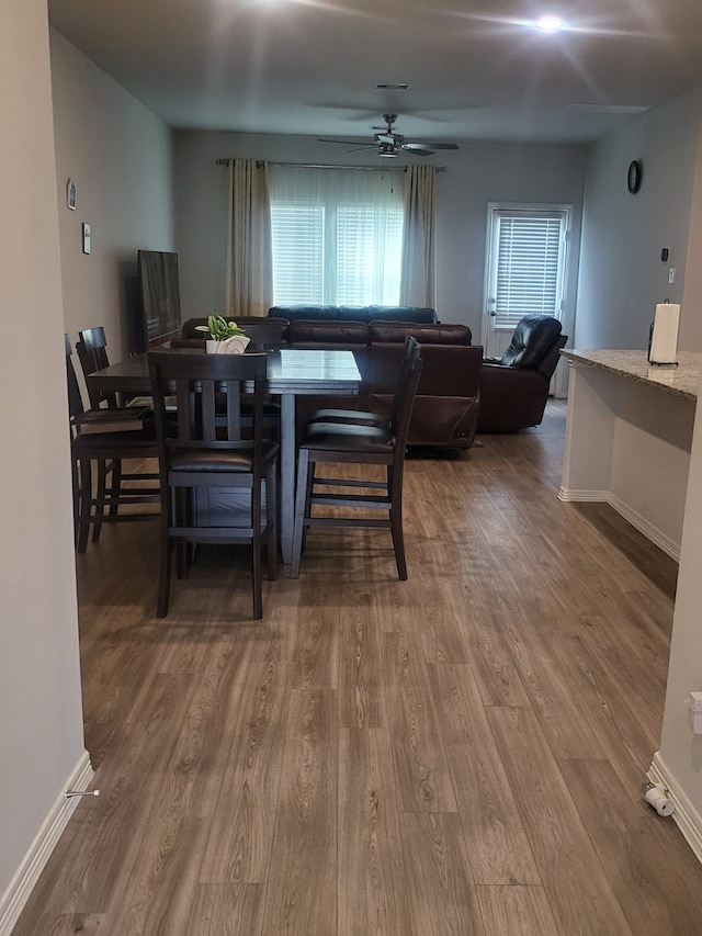 5731 Fresh View Ct, Katy, TX 77493 - dining room with a ceiling fan and wood finished floors