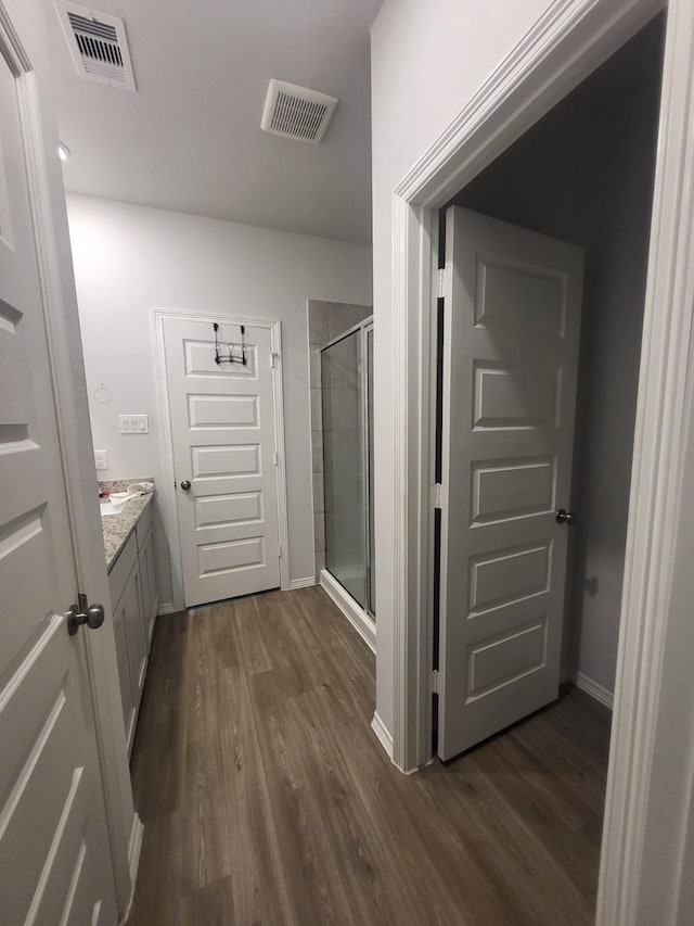 5731 Fresh View Ct, Katy, TX 77493 - full bathroom featuring a stall shower, wood finished floors, and vanity