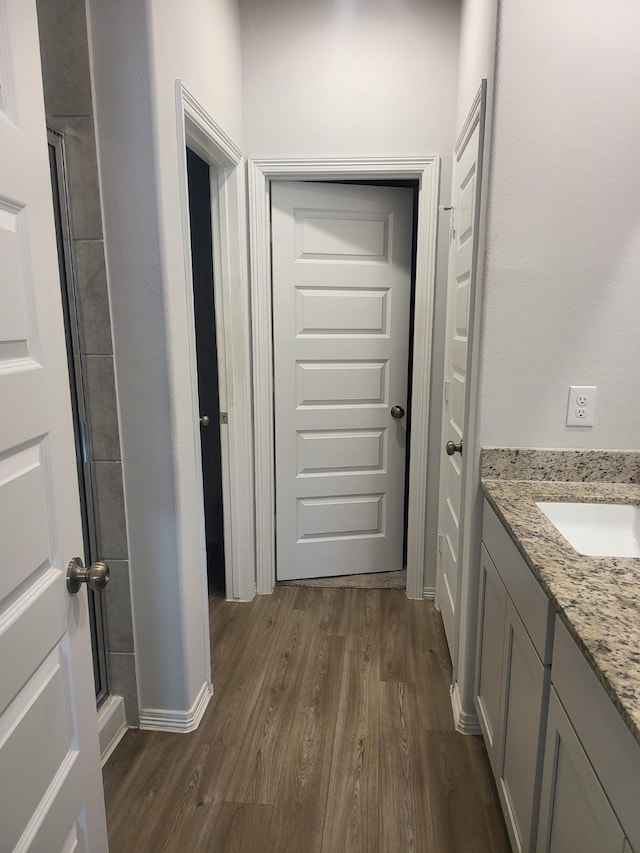 5731 Fresh View Ct, Katy, TX 77493 - full bath featuring wood finished floors, vanity, and a shower