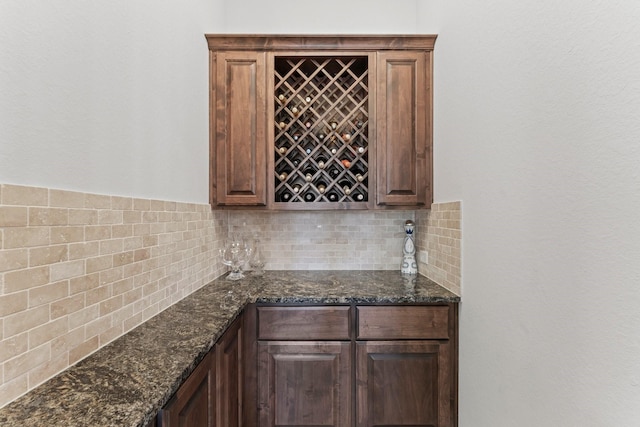 4038 Sabine Valley Trl, Spring, TX 77386 - kitchen with tasteful backsplash and dark stone counters