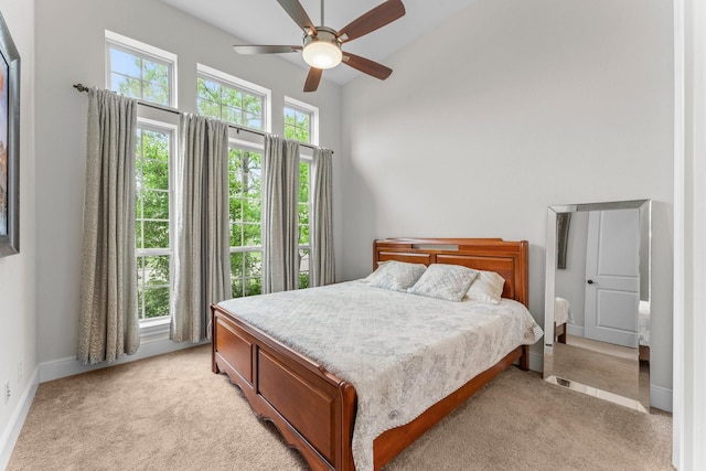 4038 Sabine Valley Trl, Spring, TX 77386 - bedroom with light colored carpet, ceiling fan, and a towering ceiling