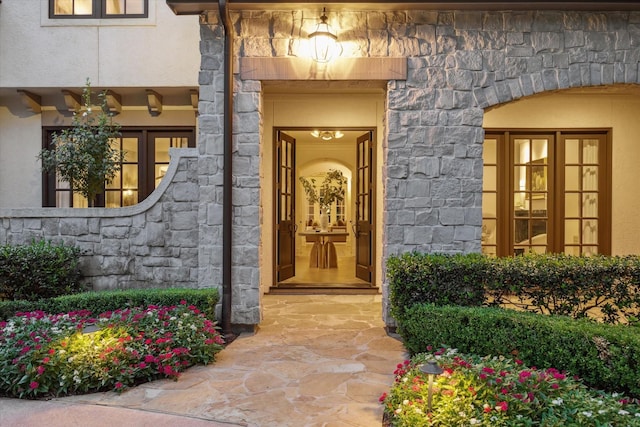 10825 Smithdale Rd, Houston, TX 77024 - property entrance with stone siding and stucco siding