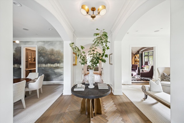 10825 Smithdale Rd, Houston, TX 77024 - entryway with arched walkways, ornamental molding, and wood finished floors