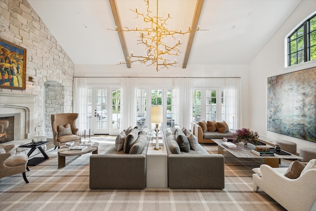 10825 Smithdale Rd, Houston, TX 77024 - living area featuring high vaulted ceiling, a chandelier, beamed ceiling, a stone fireplace, and carpet floors