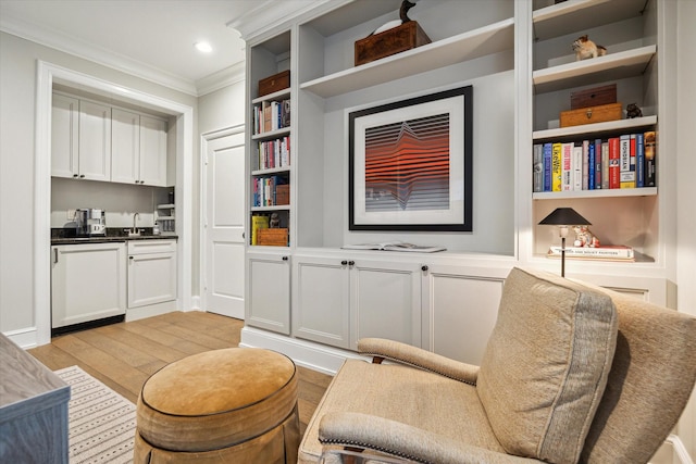 10825 Smithdale Rd, Houston, TX 77024 - living area with crown molding, light wood-type flooring, built in shelves, and recessed lighting