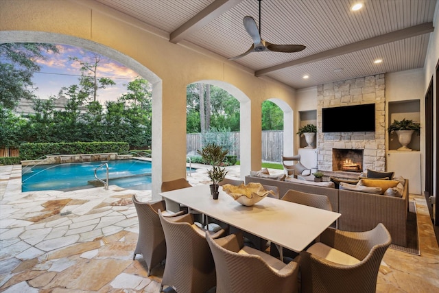 10825 Smithdale Rd, Houston, TX 77024 - view of patio with ceiling fan and an outdoor living space with a fireplace