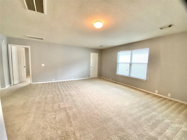 17419 Prospect Meadows Dr, Houston, TX 77095 - unfurnished room featuring light carpet and a textured ceiling