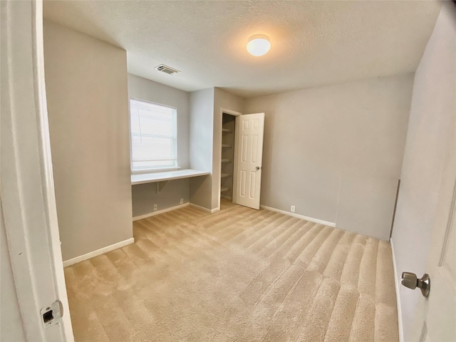 17419 Prospect Meadows Dr, Houston, TX 77095 - unfurnished bedroom featuring carpet flooring and a textured ceiling