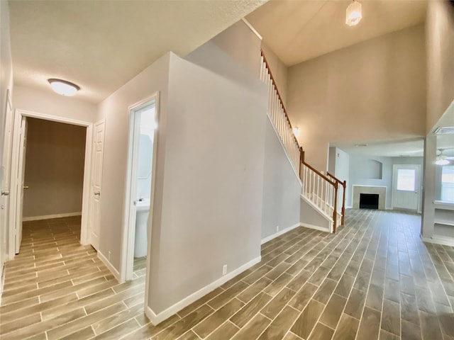 17419 Prospect Meadows Dr, Houston, TX 77095 - hall featuring wood finished floors and stairway