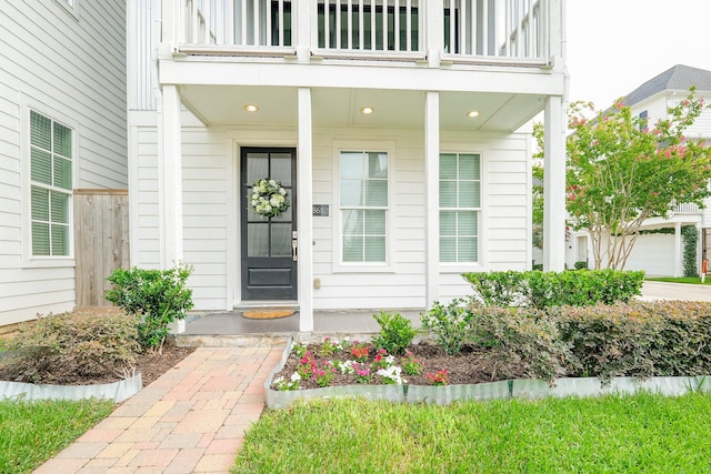 8682 Green Kolbe Ln, Houston, TX 77080 - property entrance featuring a balcony and a porch