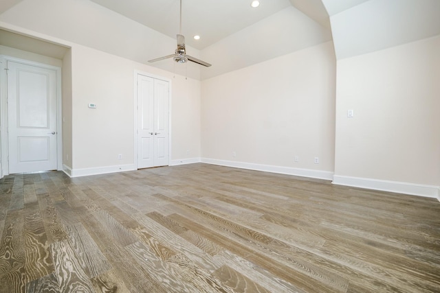 8682 Green Kolbe Ln, Houston, TX 77080 - empty room featuring a ceiling fan, wood finished floors, recessed lighting, and lofted ceiling
