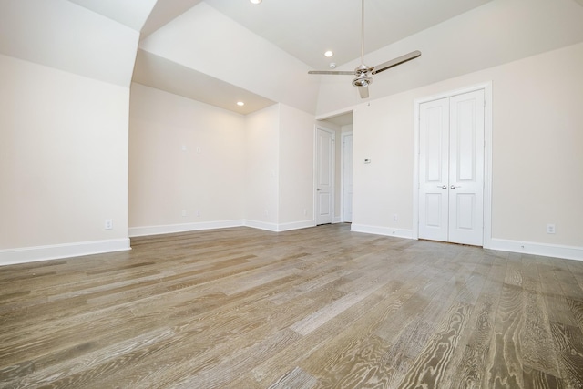 8682 Green Kolbe Ln, Houston, TX 77080 - unfurnished bedroom with wood finished floors, recessed lighting, a closet, and ceiling fan