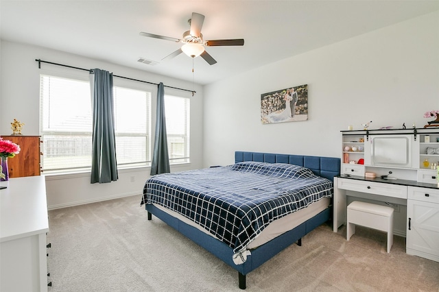 4437 Jessamine Creek Trl, Rosharon, TX 77583 - bedroom with light colored carpet and ceiling fan
