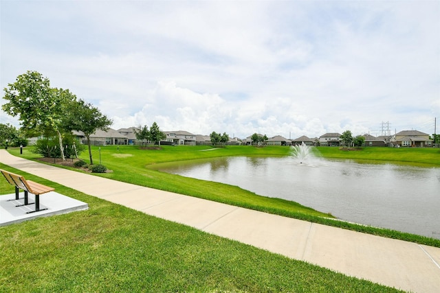 4437 Jessamine Creek Trl, Rosharon, TX 77583 - view of property's community featuring a lawn, a water view, and a residential view