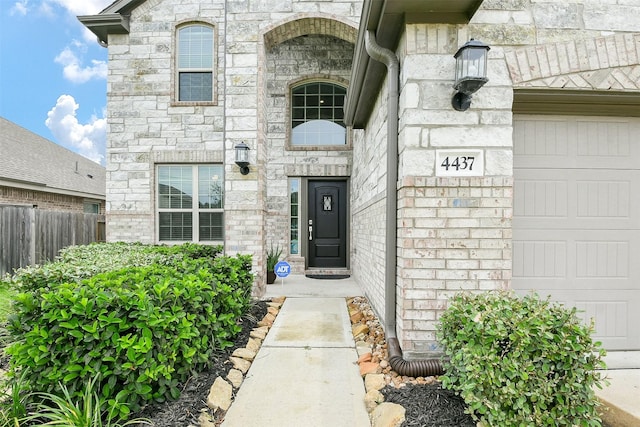 4437 Jessamine Creek Trl, Rosharon, TX 77583 - entrance to property with stone siding and a garage