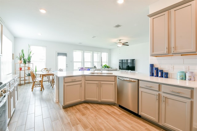 4437 Jessamine Creek Trl, Rosharon, TX 77583 - kitchen featuring dishwasher, a peninsula, ceiling fan, recessed lighting, and light countertops
