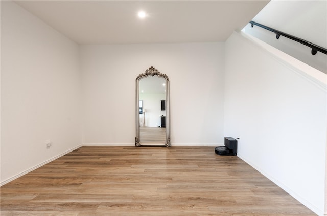 21427 Hawthorn Prairie Dr, New Caney, TX 77357 - spare room featuring light wood finished floors and recessed lighting
