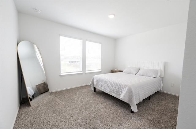 21427 Hawthorn Prairie Dr, New Caney, TX 77357 - carpeted bedroom featuring baseboards