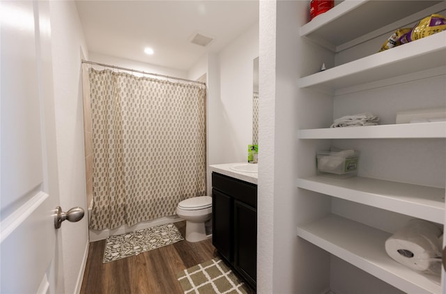 21427 Hawthorn Prairie Dr, New Caney, TX 77357 - full bath featuring vanity, wood finished floors, a shower with shower curtain, and recessed lighting