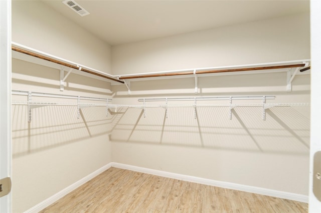 10126 Relic Oaks, San Antonio, TX 78240 - walk in closet featuring wood finished floors