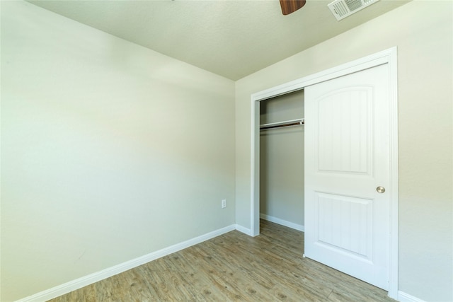 10126 Relic Oaks, San Antonio, TX 78240 - unfurnished bedroom featuring light wood-style floors and a closet