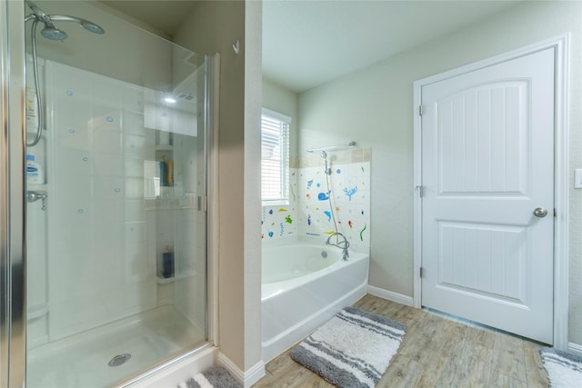10126 Relic Oaks, San Antonio, TX 78240 - bathroom with a stall shower, wood finished floors, and a garden tub